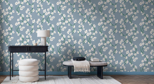 Hand illustrated Dilly Dally styled interior scene featuring a wall covered in blue-gray floral wallpaper with white blossoms and green stems by HDWALLS Type II vinyl