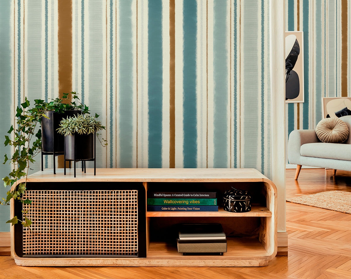 Modern living room with beautiful wallcovering and a wooden console table, striped wallpaper, and a chair.