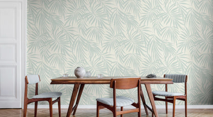 Soft teal botanical wallpaper in coastal interior — Fronds Light Teal by HDWALLS