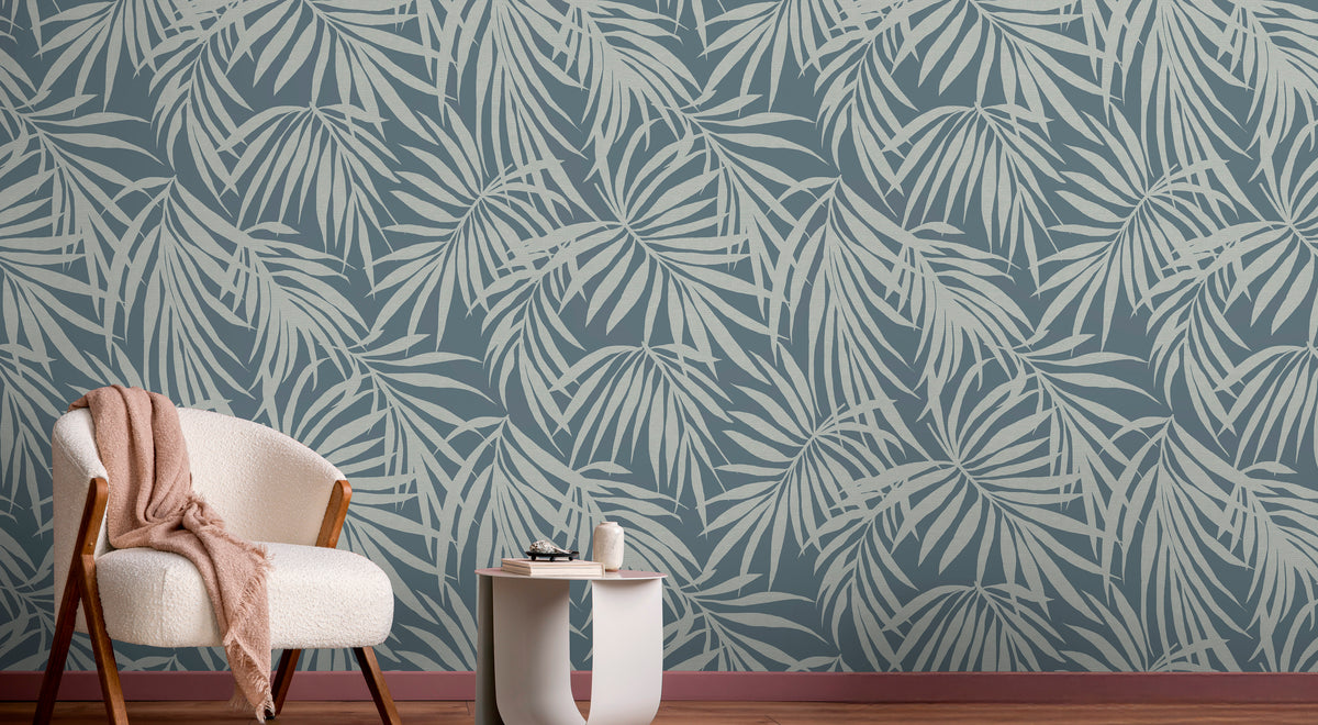 Fronds Silhouette Slate Blue by HDWALLS — tropical palm wallcovering shown in a room setting