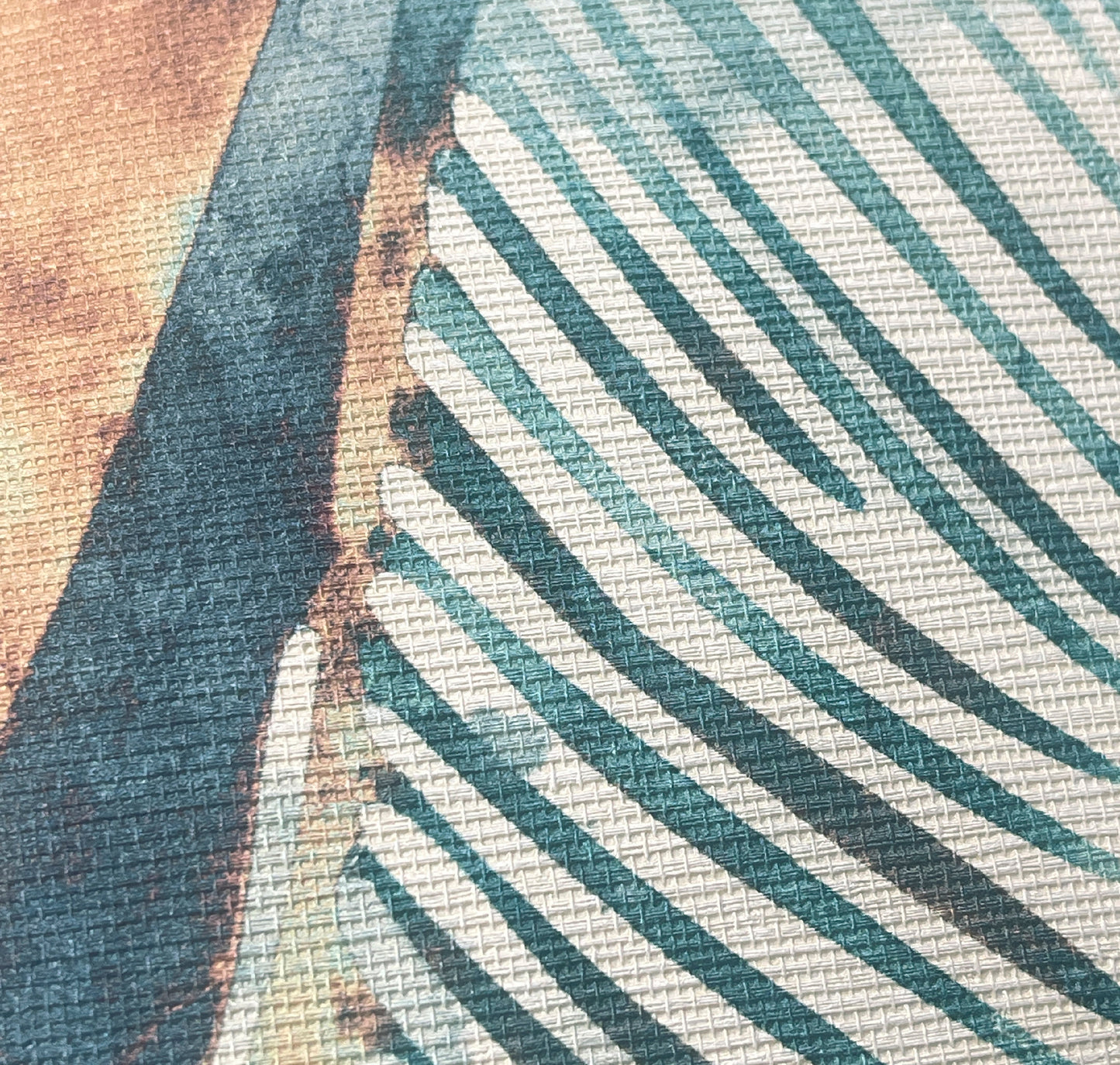 Close-up of a textured fabric with a leaf pattern