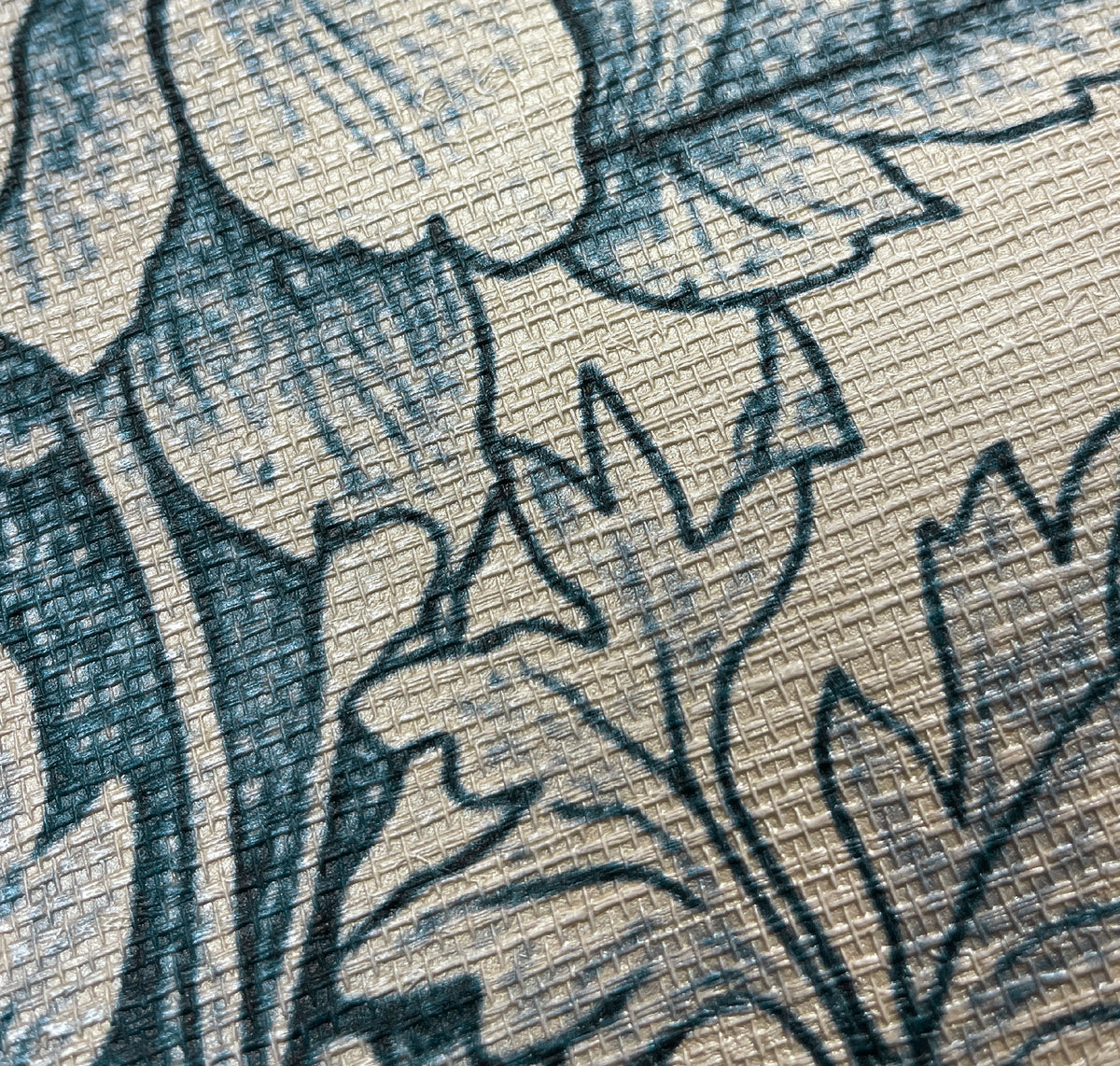 DWALLS WOODLAND Navy Jute macro showing navy botanical ink against the light beige woven emboss of AMAMI vinyl